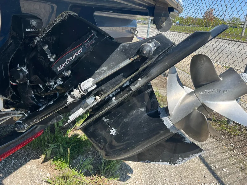 Slide: The Image of 2020 Sea Ray SPX 230 MerCruiser engine with propeller, close-up view. - 14