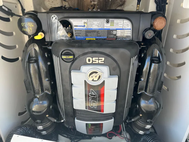 Slide: The Image of Engine of a 2020 Sea Ray SPX 230 boat, featuring a 4.5L 250 horsepower motor. - 15