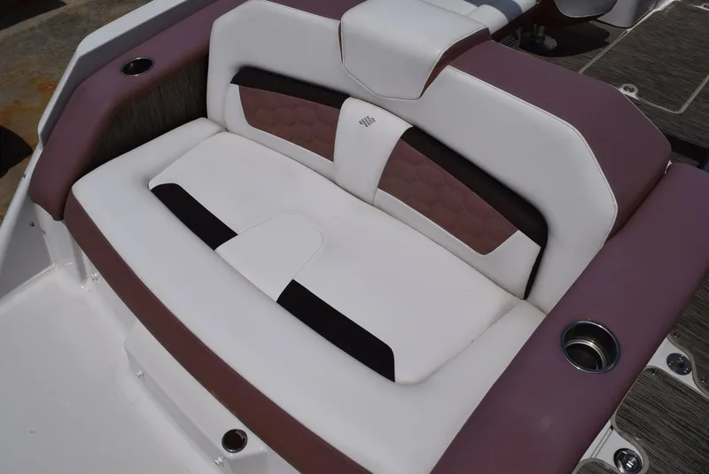 Slide: The Image of 2018 Four Winns HD240 OB boat seat with white and brown upholstery. - 15