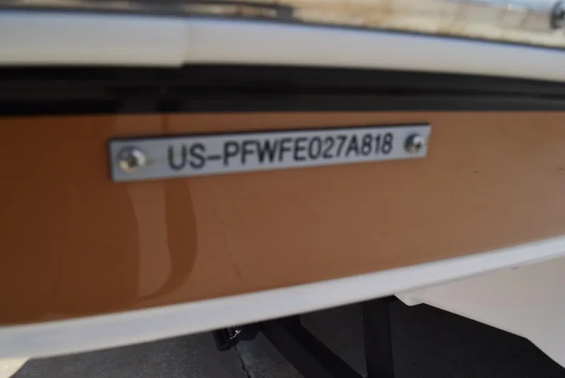 Slide: The Image of 2018 Four Winns HD240 OB boat with visible hull identification number. - 17