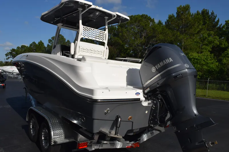 Slide: The Image of 2025 Hurricane Center Console 24 OB boat with Yamaha engine on trailer. - 6