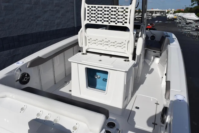 Slide: The Image of 2025 Hurricane Center Console 24 OB boat interior with seating and storage. - 7