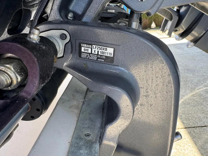 Slide: The Image of Close-up of Yamaha LF250XB engine part on 1990 Grady-White Marlin 28 boat. - 31