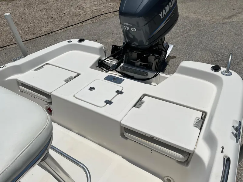 Slide: The Image of 2006 NauticStar 2110 Nautic Bay boat with Yamaha outboard motor, rear deck view. - 15