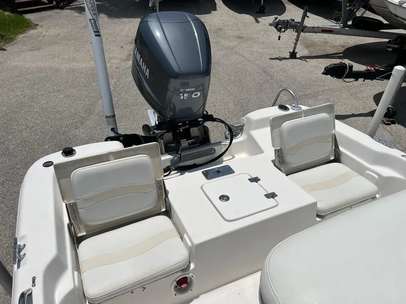 Slide: The Image of 2006 NauticStar 2110 Nautic Bay boat with Yamaha 150 engine, featuring dual seating. - 3