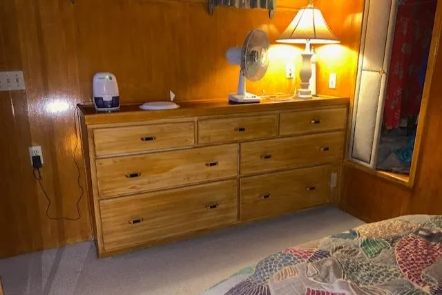 Slide: The Image of Interior of 1991 King's Craft 48 Motor Yacht with wooden furniture. - 24