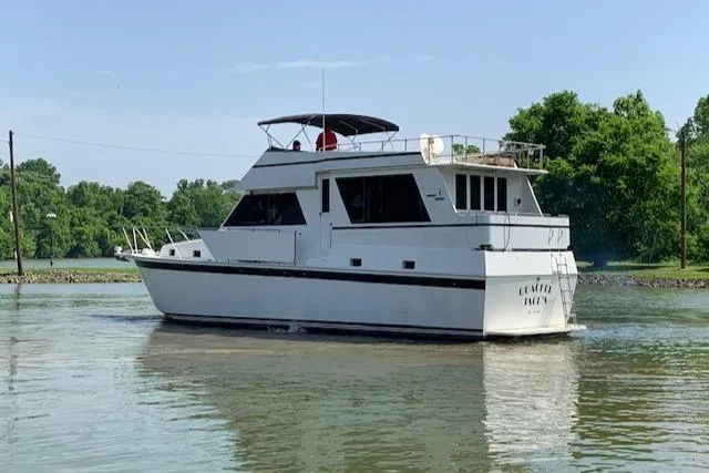 Slide: The Image of 1991 King's Craft 48 Motor Yacht on calm water. - 3