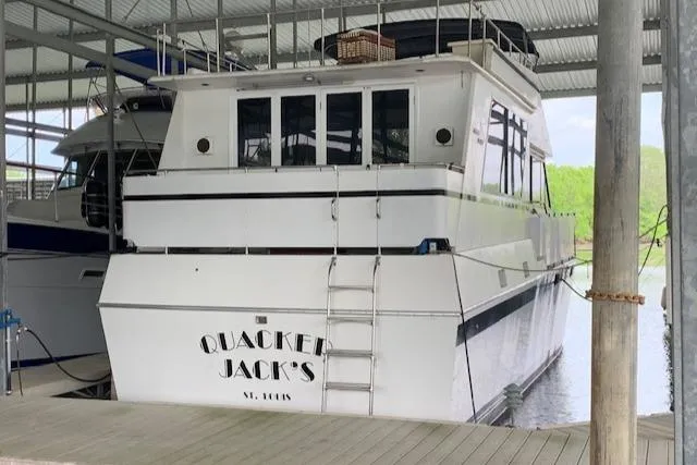 Slide: The Image of 1991 King's Craft 48 Motor Yacht docked, "Quacker Jack's". - 7