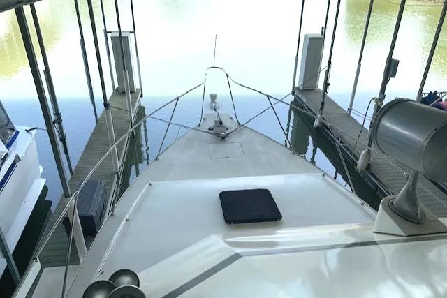 Slide: The Image of 1991 King's Craft 48 Motor Yacht docked in marina. - 8