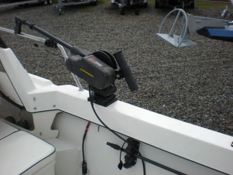 Slide: The Image of 2010 Arima SEA CHASER boat with mounted fishing equipment on deck. - 10