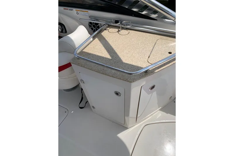 Slide: The Image of Interior of 2012 Monterey M5 MSX Sport Boat with countertop and seating. - 10