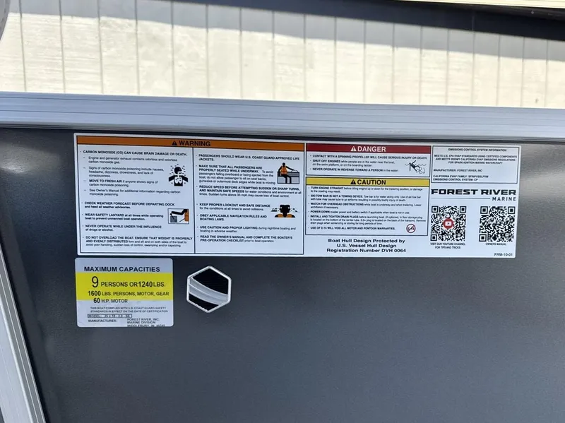 Slide: The Image of Warning and capacity labels on a 2025 South Bay 18CR SE S Cruise boat. - 10