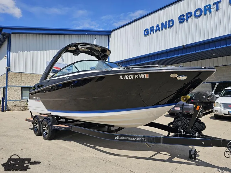 Slide: The Image of 2018 Monterey 258 Super Sport boat on trailer outside Grand Sport building. - 10