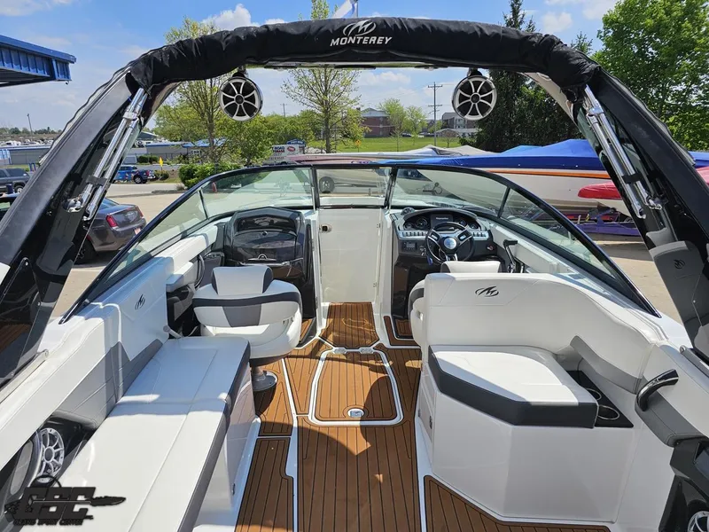Slide: The Image of 2018 Monterey 258 Super Sport boat interior with seating and steering wheel. - 35