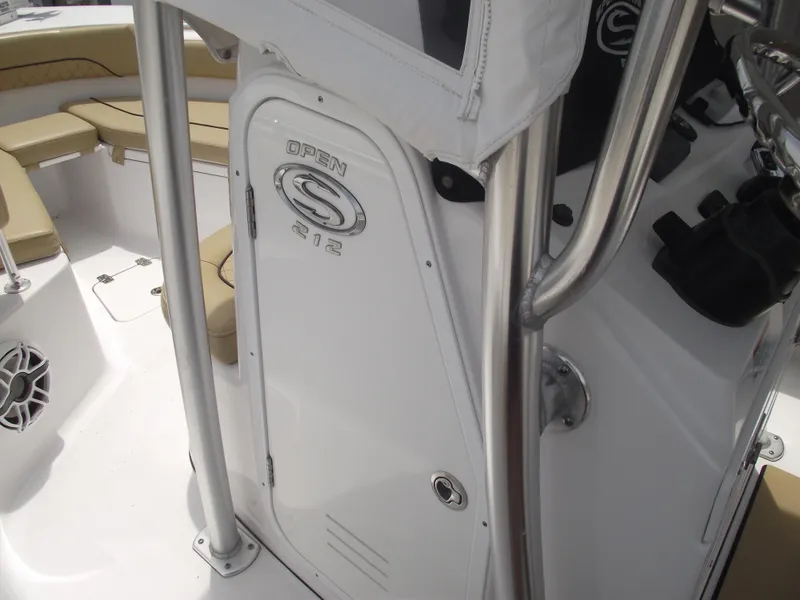 Slide: The Image of 2021 Sportsman Open 212 Center Console boat interior with seating and console details. - 22