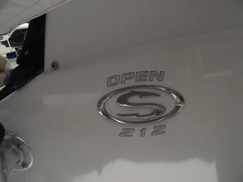 Slide: The Image of 2021 Sportsman Open 212 Center Console logo on boat exterior. - 24