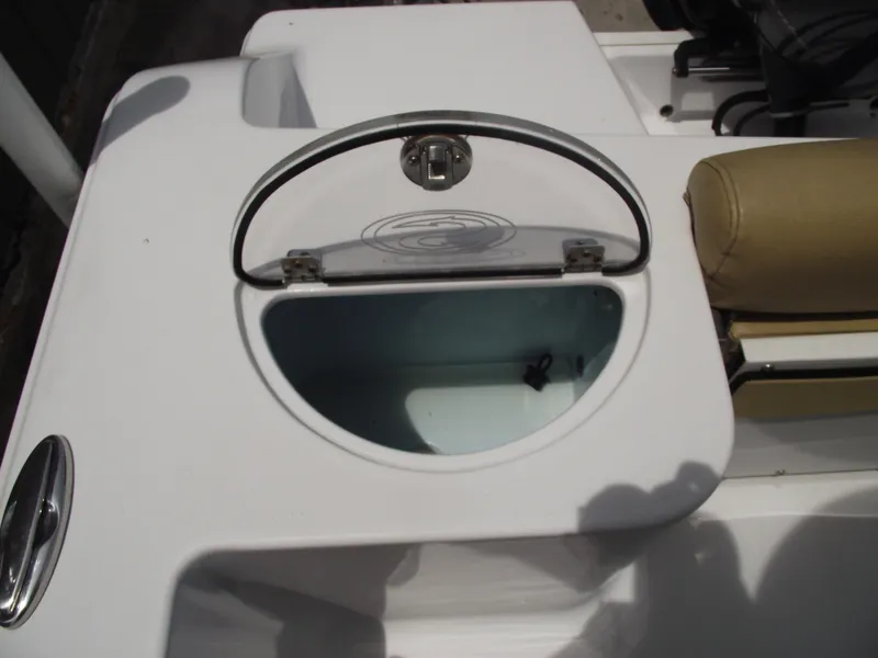 Slide: The Image of 2021 Sportsman Open 212 Center Console boat with open storage compartment. - 40