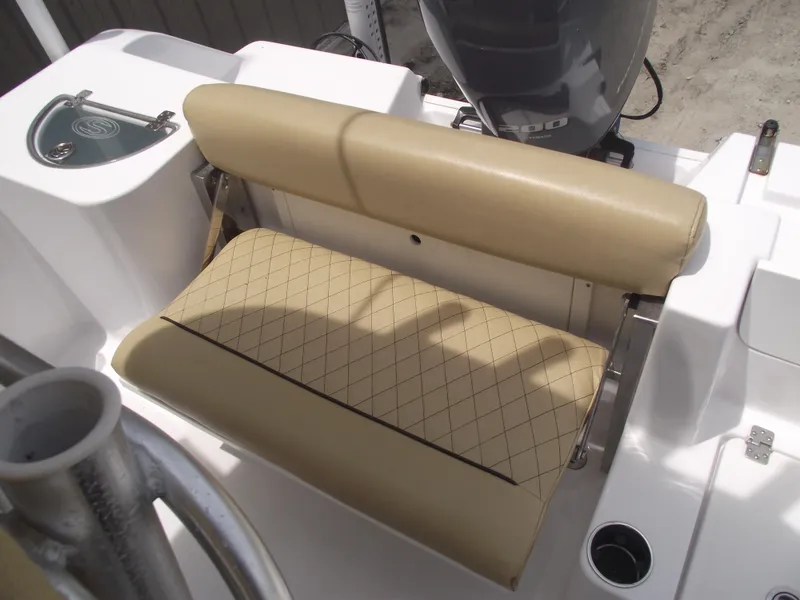 Slide: The Image of 2021 Sportsman Open 212 Center Console boat seat with beige upholstery and diamond pattern. - 42