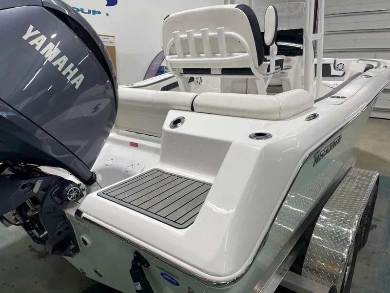 Slide: The Image of 2025 Tidewater 210LXF boat with Yamaha engine, featuring sleek design and comfortable seating. - 10