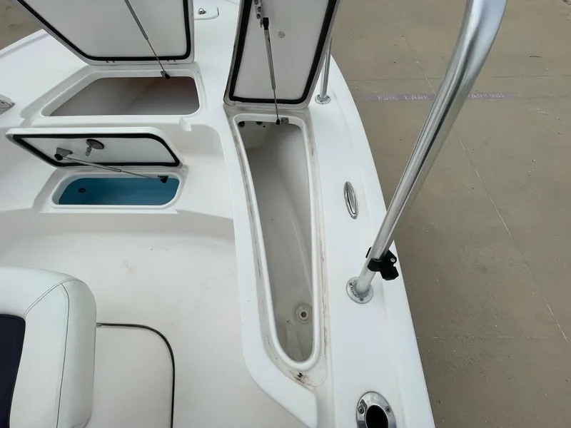 Slide: The Image of 2022 Tidewater 2110BM boat storage compartments and seating area. - 33