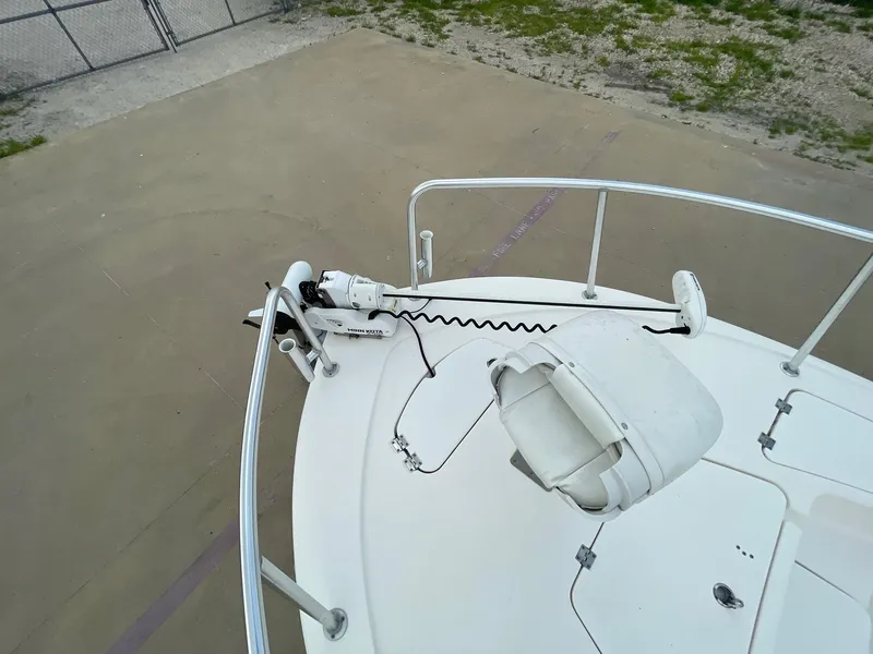 Slide: The Image of 2022 Tidewater 2110BM boat deck with mounted equipment and railing. - 34