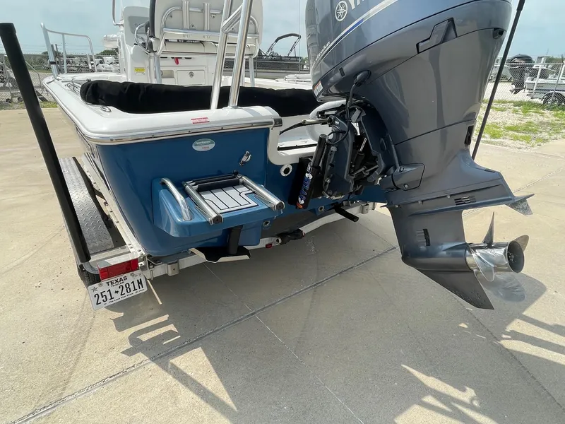Slide: The Image of 2022 Tidewater 2110BM boat with Yamaha outboard motor on trailer. - 9