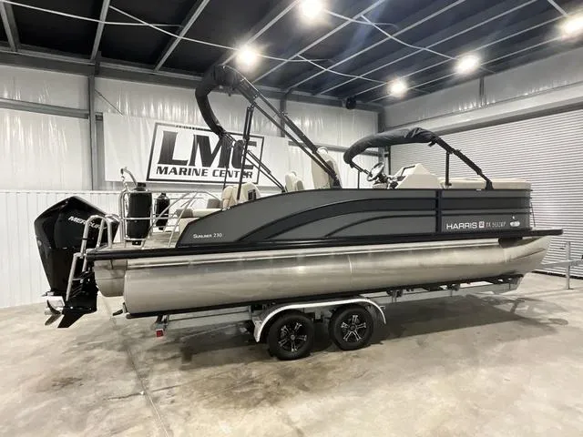 Slide: The Image of 2022 Harris SUNLINER 230 SLDH pontoon boat in showroom, side view. - 3