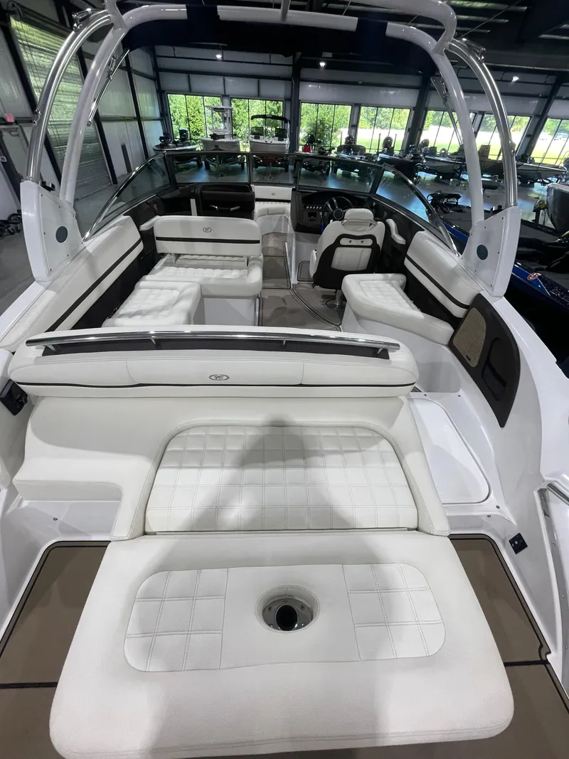 Slide: The Image of 2018 Cobalt R5 boat interior with white seating and modern design. - 16