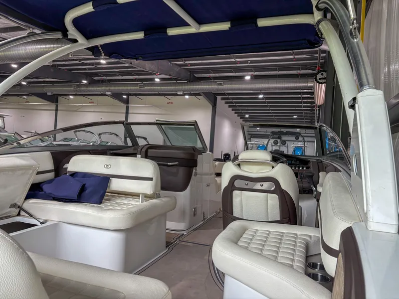 Slide: The Image of Interior of a 2018 Cobalt R5 boat with luxurious seating and modern design. - 6