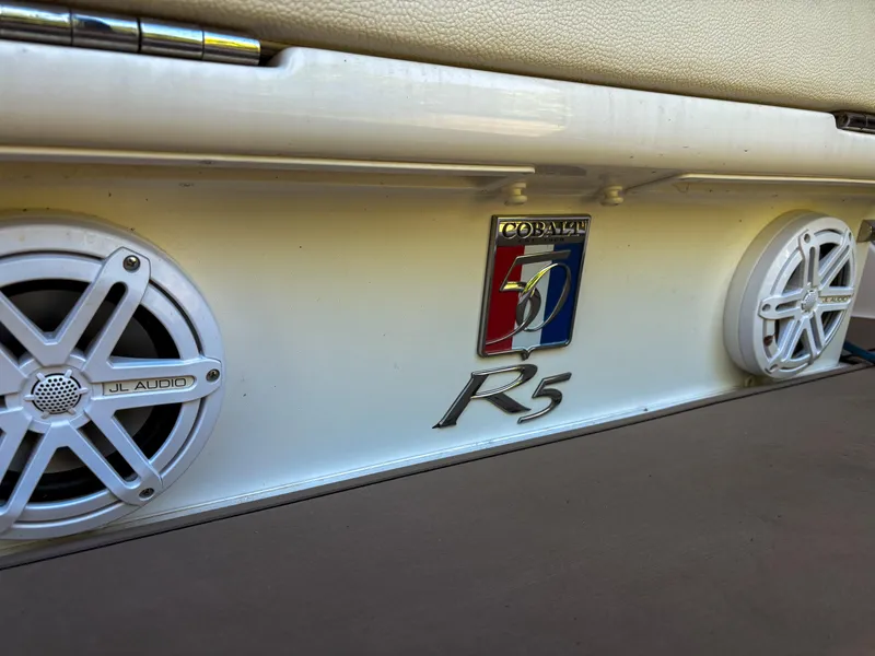 Slide: The Image of 2018 Cobalt R5 boat with JL Audio speakers and logo detail. - 9