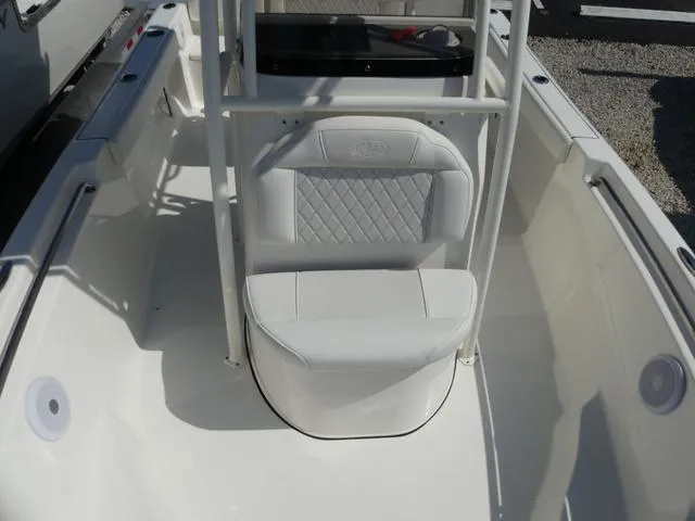 Slide: The Image of 2025 Key West 189 FS boat interior with white seating and console. - 12