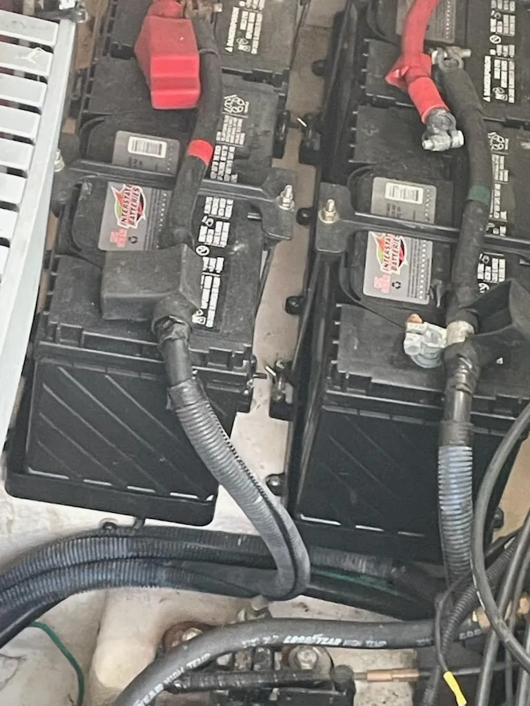 Slide: The Image of Batteries in a 2007 Sea Ray 310 Sundancer boat engine compartment. - 27