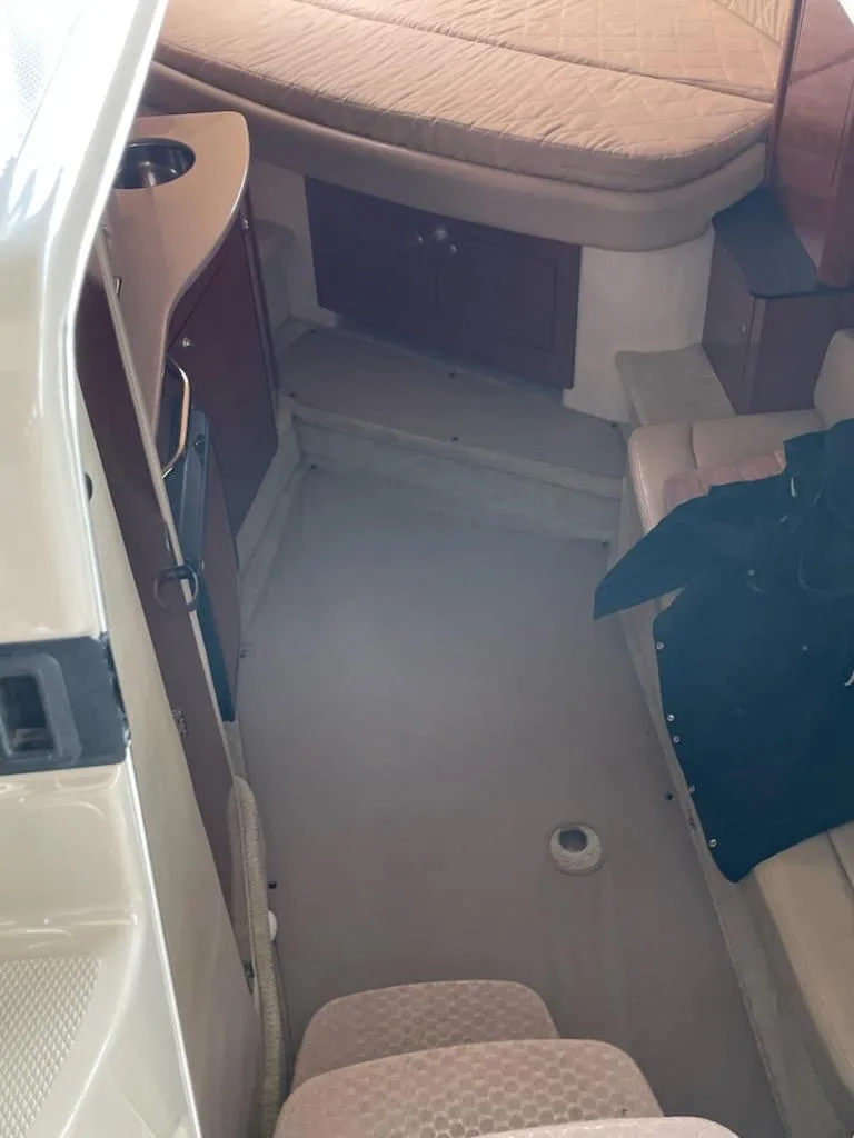 Slide: The Image of Interior cabin of 2007 Sea Ray 310 Sundancer with seating and bed. - 28