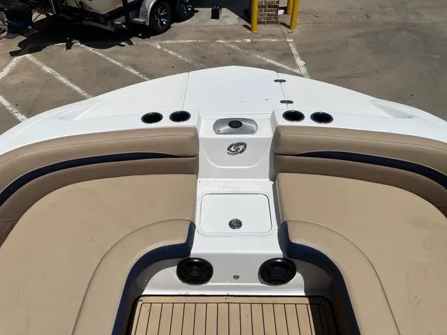 Slide: The Image of Bow seating area of a 2020 Hurricane SS218 boat with beige cushions. - 9