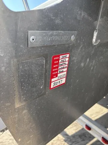 Slide: The Image of 2023 Godfrey SW2080CX boat identification plate with stock and model details. - 7