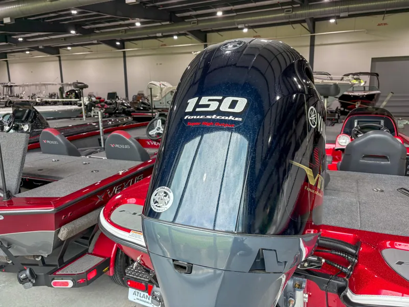 Slide: The Image of 2023 Falcon F185 boat with 150 horsepower four-stroke engine in showroom. - 11