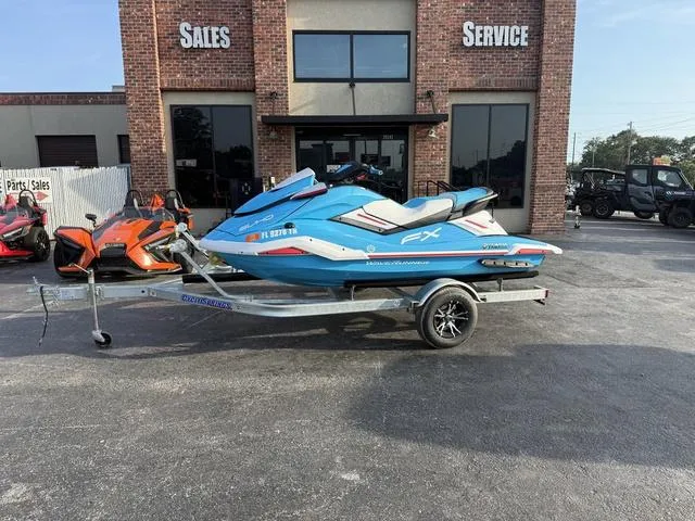 Slide: The Image of 2022 Yamaha Marine Waverunner FX on trailer outside sales and service building. - 1