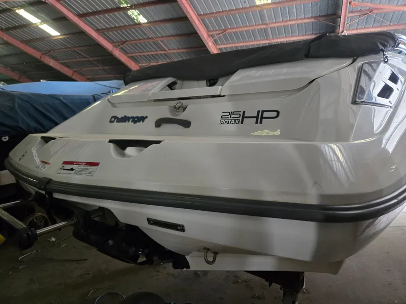 Slide: The Image of 2008 Sea-Doo 180 Challenger boat with 215 HP Rotax engine in storage. - 3