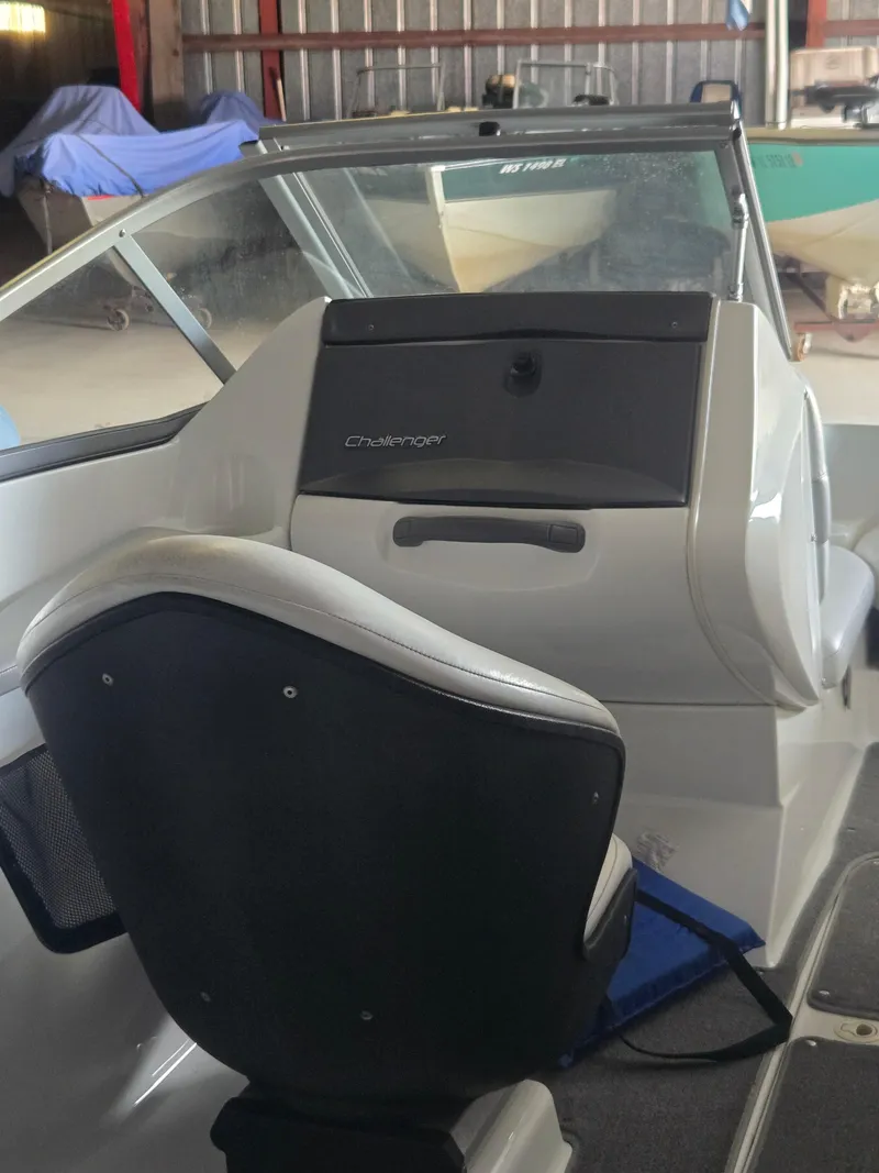 Slide: The Image of 2008 Sea-Doo 180 Challenger boat interior with steering console and seat. - 5