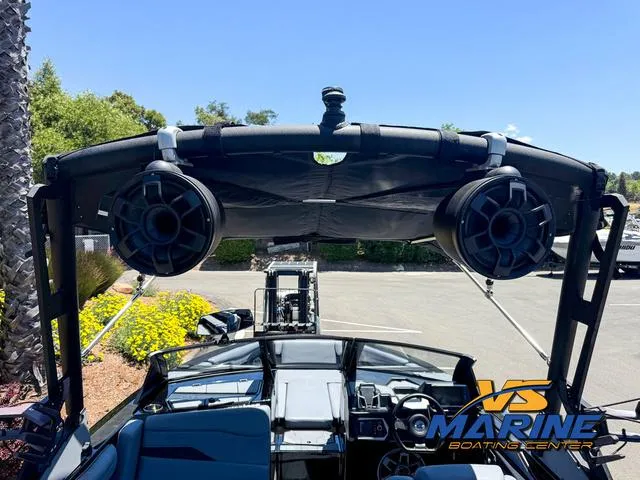 Slide: The Image of 2023 Axis Wake Research T250 boat with speakers and canopy at VS Marine Boating Center. - 23