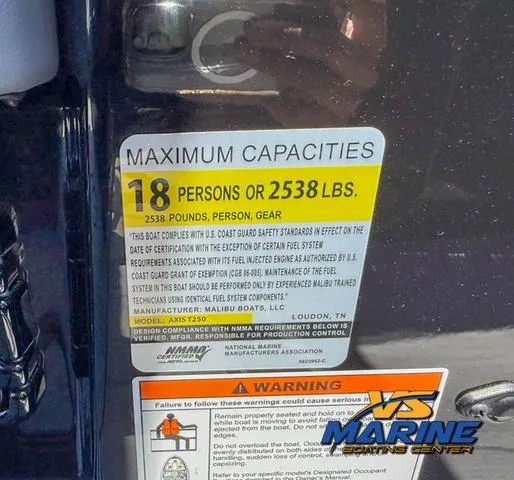 Slide: The Image of 2023 Axis Wake Research T250 capacity label, 18 persons or 2538 lbs, safety compliance details. - 27