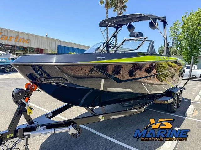 Slide: The Image of 2023 Axis Wake Research T250 boat on trailer at VS Marine Boating Center. - 4