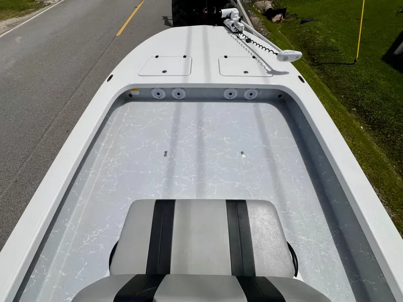 Slide: The Image of 2021 Majek REAPER boat deck with seating, viewed from above on a road. - 13