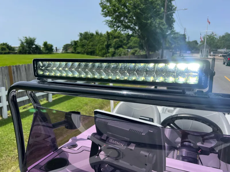 Slide: The Image of 2021 Majek REAPER boat with LED light bar and Garmin navigation system. - 19