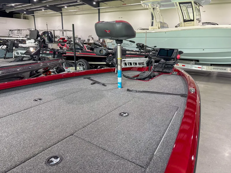 Slide: The Image of 2022 Vexus AVX 2080 boat interior with fishing seat and equipment in showroom. - 3