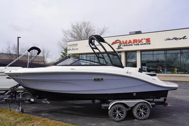 Slide: The Image of 2024 Sea Ray SPX 210 boat on trailer at Mark's Leisure Time Marine dealership. - 1