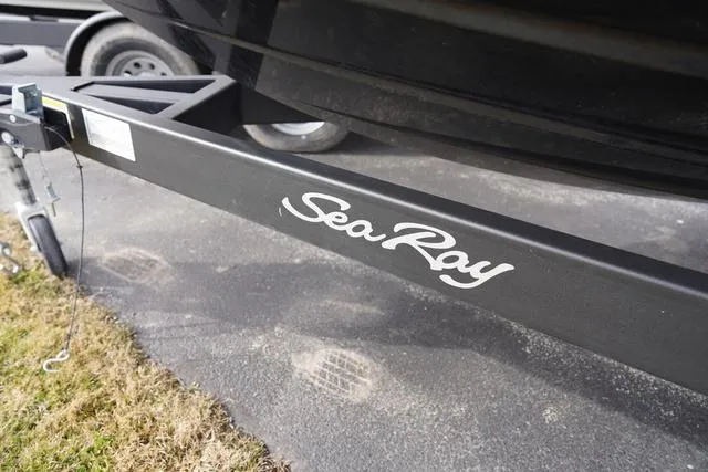 Slide: The Image of Trailer of 2024 Sea Ray SPX 210 boat with logo visible. - 11