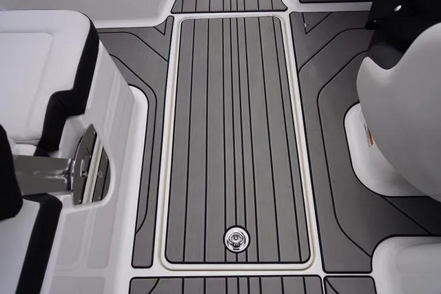 Slide: The Image of 2024 Sea Ray SPX 210 boat deck with sleek, modern design and gray detailing. - 13