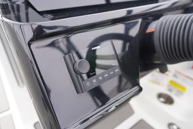 Slide: The Image of 2024 Sea Ray SPX 210 boat dashboard with Fusion stereo system. - 25