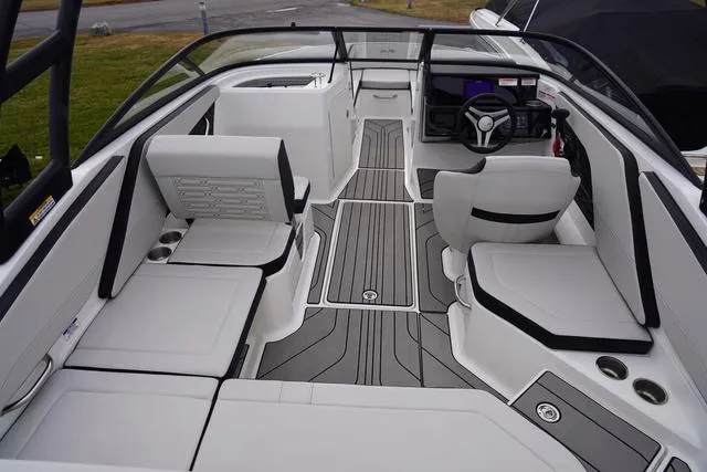 Slide: The Image of 2024 Sea Ray SPX 210 boat interior with sleek seating and modern design. - 35